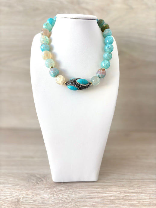 Necklace with blue crystal stones and exotic stones