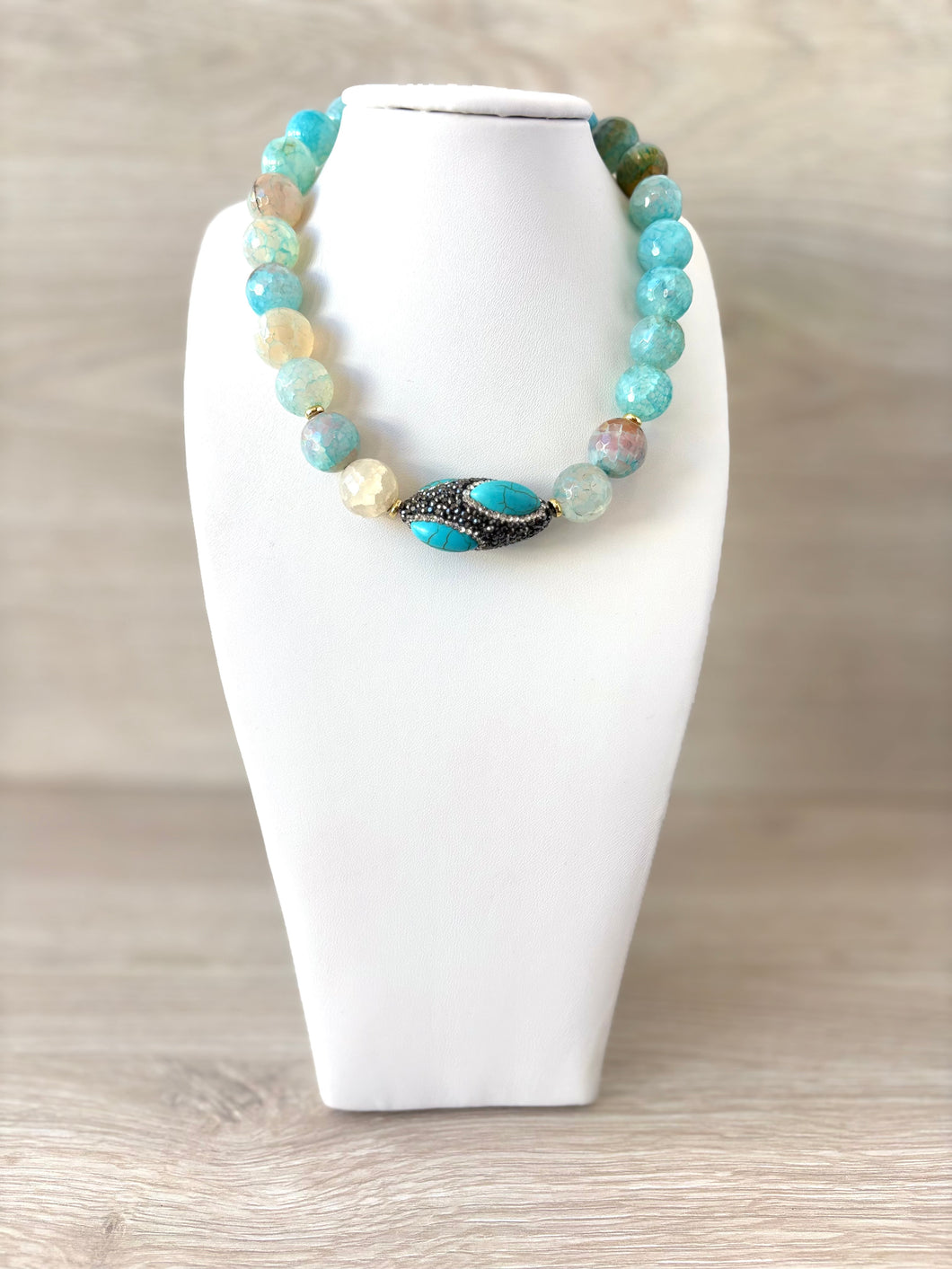 Necklace with blue crystal stones and exotic stones